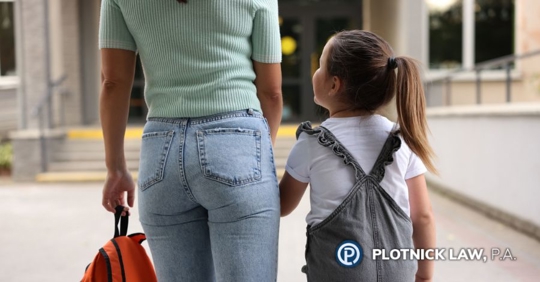 mother and child going to school